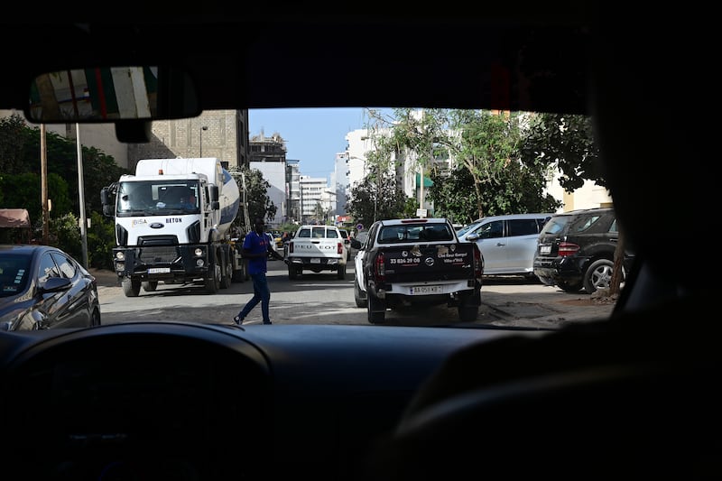 A street scene as seen from inside a car in Dakar, Senegal, in May 2024.