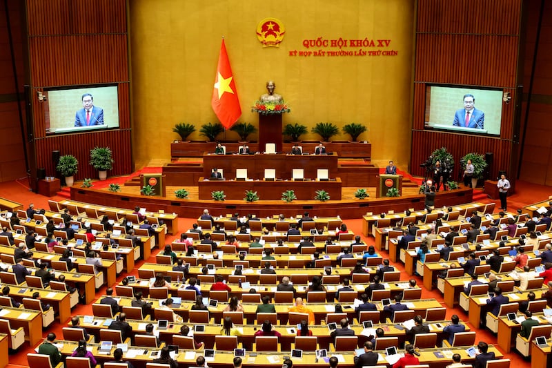 Vietnam's members of parliament attend the National Assembly's extraordinary session opening in Hanoi on February 12, 2025. (Photo by Dang ANH / AFP)